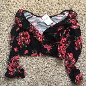 Black and red floral ruffle top